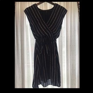 Cute navy dress with white stripes.